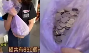 Tranh cãi chuyện trả lương bằng tiền xu Tranh cãi chuyện trả lương bằng tiền xu